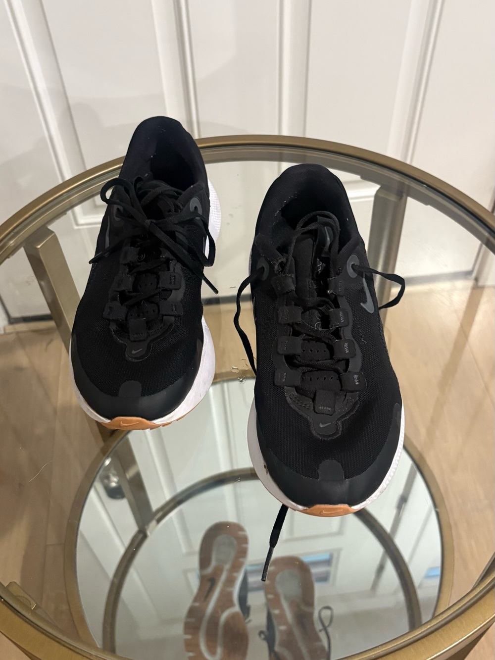 Nike Black Athletic Sneakers with White Midsole and Tan Accents